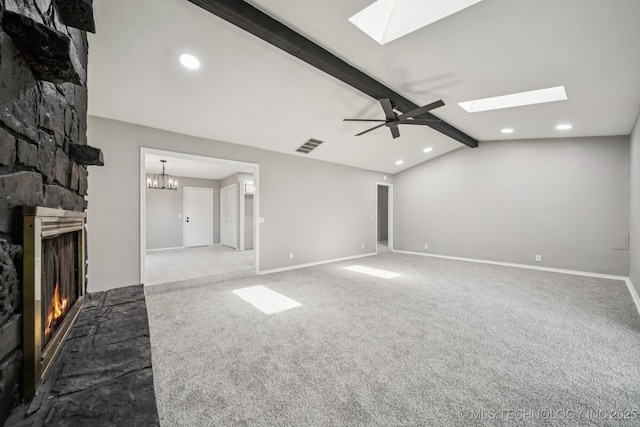 2712 S Fir Ave, Broken Arrow, OK 74012 - unfurnished living room featuring a skylight, recessed lighting, a fireplace, carpet, and a ceiling fan