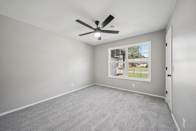 2712 S Fir Ave, Broken Arrow, OK 74012 - carpeted empty room with ceiling fan and baseboards