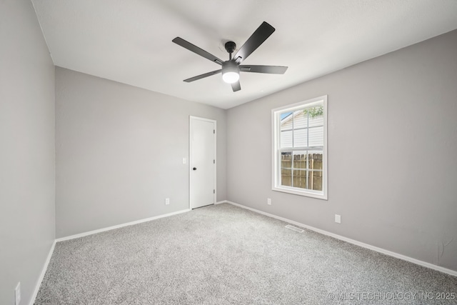 2712 S Fir Ave, Broken Arrow, OK 74012 - carpeted spare room featuring baseboards and ceiling fan