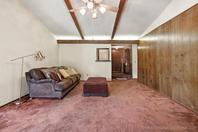 12452 E 36th St, Tulsa, OK 74146 - living room with a ceiling fan, carpet, and wood walls