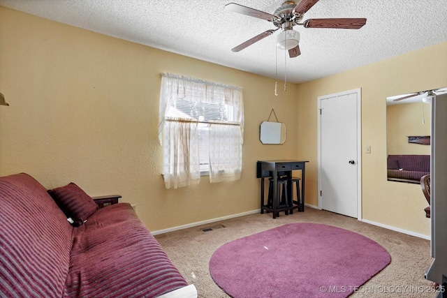 12452 E 36th St, Tulsa, OK 74146 - sitting room featuring carpet flooring, ceiling fan, and a textured ceiling