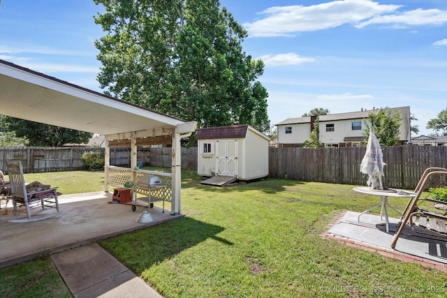 12452 E 36th St, Tulsa, OK 74146 - fenced backyard with a patio area and a storage shed