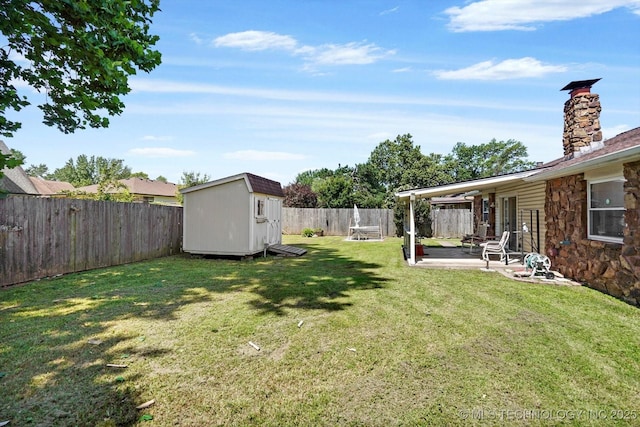 12452 E 36th St, Tulsa, OK 74146 - fenced backyard with a storage shed and a patio area