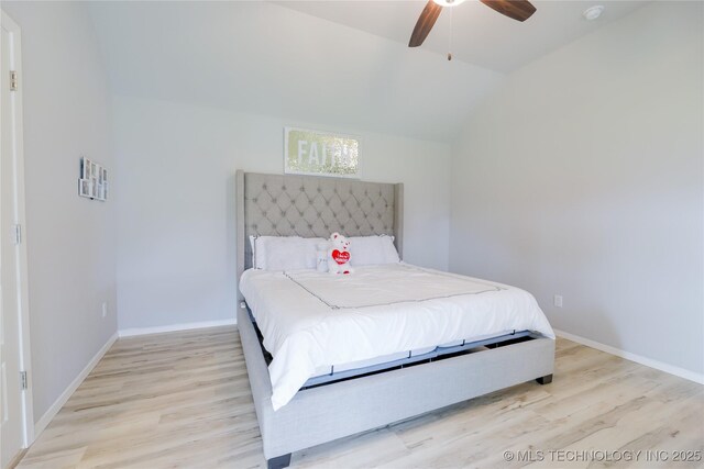 9516 E 131st Pl S, Bixby, OK 74008 - bedroom featuring light wood-style flooring, lofted ceiling, and a ceiling fan
