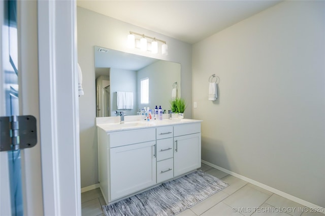 9516 E 131st Pl S, Bixby, OK 74008 - full bathroom with double vanity and tile patterned floors