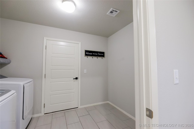 9516 E 131st Pl S, Bixby, OK 74008 - laundry room with separate washer and dryer and light tile patterned flooring