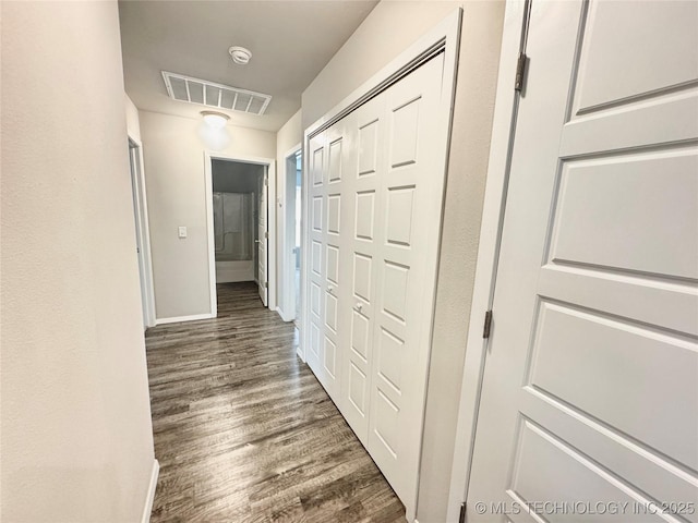 8314 E 162nd St S, Bixby, OK 74008 - hallway featuring baseboards and wood finished floors