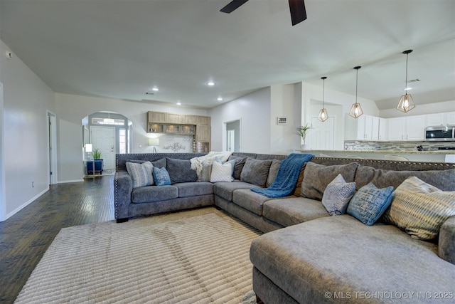 124 W 125th Ct S, Jenks, OK 74037 - living area featuring arched walkways, dark wood-style flooring, a ceiling fan, and recessed lighting