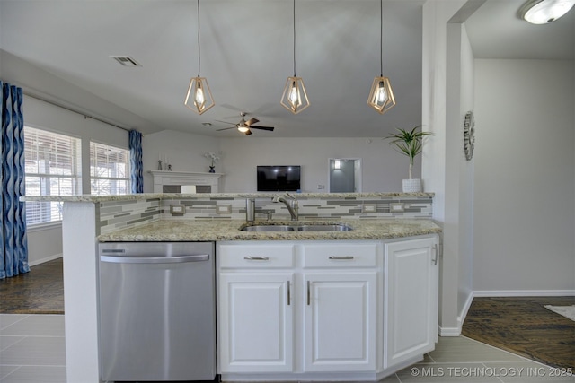 124 W 125th Ct S, Jenks, OK 74037 - kitchen featuring stainless steel dishwasher, backsplash, a ceiling fan, and light stone counters
