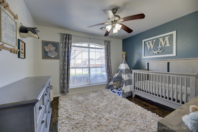 124 W 125th Ct S, Jenks, OK 74037 - bedroom with dark wood-style flooring and ceiling fan