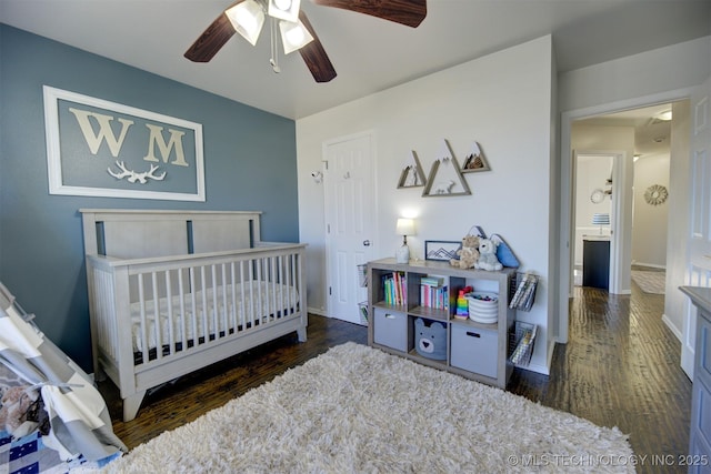 124 W 125th Ct S, Jenks, OK 74037 - bedroom with wood finished floors, a nursery area, and a ceiling fan