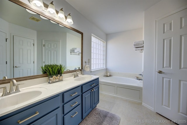124 W 125th Ct S, Jenks, OK 74037 - full bathroom with tile patterned flooring, double vanity, and a bath