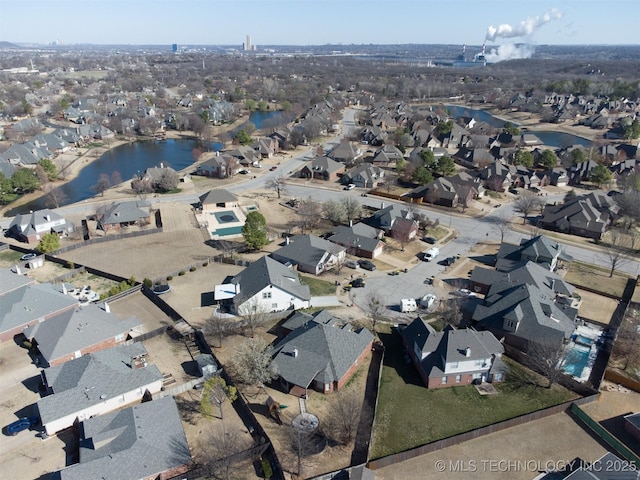 124 W 125th Ct S, Jenks, OK 74037 - aerial view of property and surrounding area with nearby suburban area and a nearby body of water
