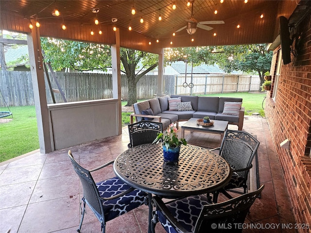 124 W 125th Ct S, Jenks, OK 74037 - fenced backyard featuring a patio area, an outdoor living space, ceiling fan, and outdoor dining area