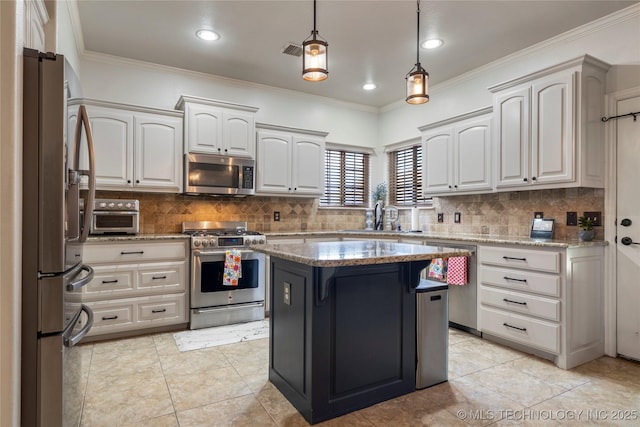 2611 S 15th Pl, Broken Arrow, OK 74012 - kitchen with appliances with stainless steel finishes, light stone countertops, crown molding, backsplash, and a breakfast bar