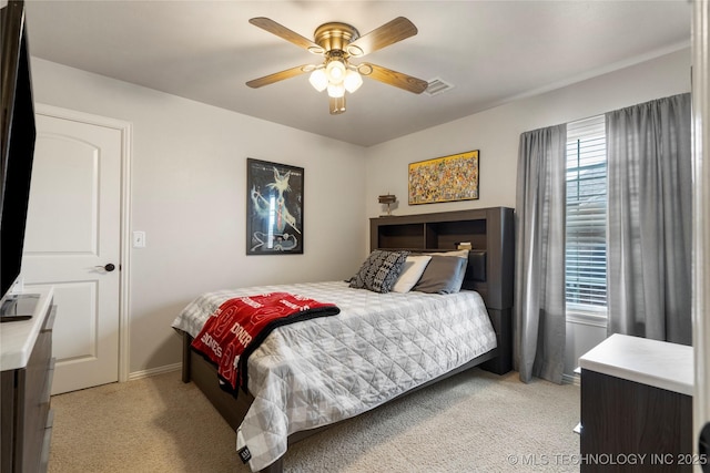 2611 S 15th Pl, Broken Arrow, OK 74012 - bedroom with light colored carpet and ceiling fan