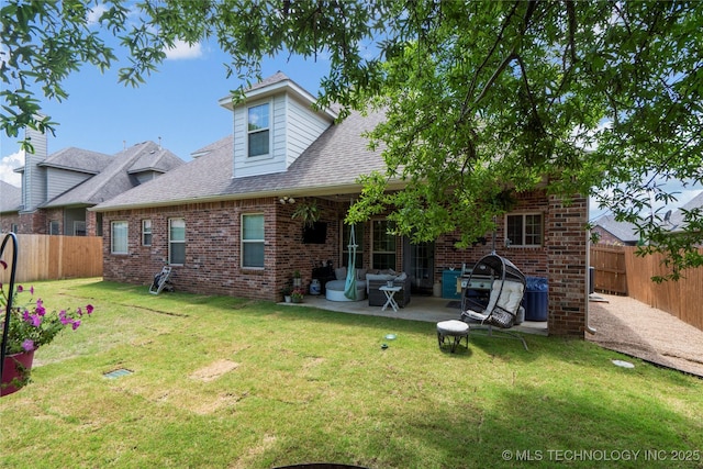 2611 S 15th Pl, Broken Arrow, OK 74012 - back of house with brick siding, a patio, and a fenced backyard