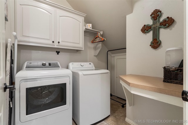 2611 S 15th Pl, Broken Arrow, OK 74012 - washroom with washer and clothes dryer, cabinet space, and light tile patterned flooring