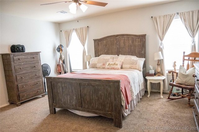 1330 Panther Ln, Sapulpa, OK 74066 - bedroom with light carpet and ceiling fan