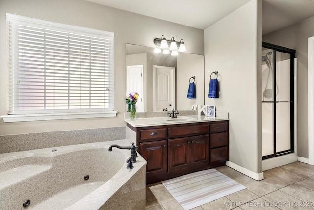 1801 E Montgomery St, Broken Arrow, OK 74012 - bathroom with a whirlpool tub, vanity, a shower stall, and tile patterned flooring
