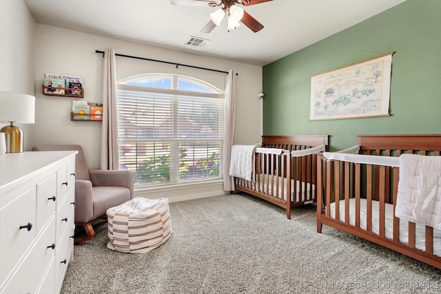 1801 E Montgomery St, Broken Arrow, OK 74012 - carpeted bedroom featuring a nursery area and a ceiling fan