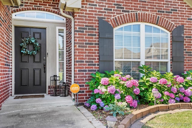 1801 E Montgomery St, Broken Arrow, OK 74012 - view of exterior entry featuring brick siding