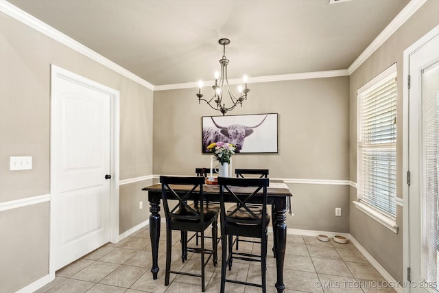 1801 E Montgomery St, Broken Arrow, OK 74012 - dining area with light tile patterned flooring, a chandelier, and ornamental molding