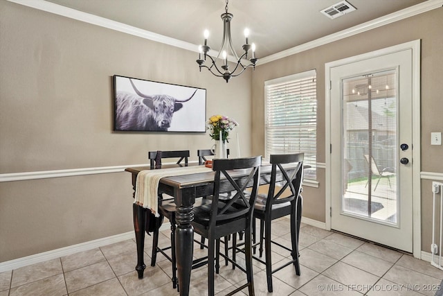 1801 E Montgomery St, Broken Arrow, OK 74012 - dining room featuring a chandelier, light tile patterned floors, and ornamental molding