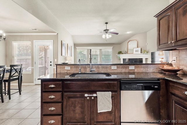 1801 E Montgomery St, Broken Arrow, OK 74012 - kitchen featuring dishwasher, ceiling fan, dark stone counters, tasteful backsplash, and light tile patterned floors