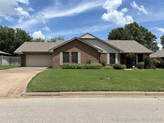 1124 Surrey Dr, Ardmore, OK 73401 - single story home with brick siding, concrete driveway, a garage, and a shingled roof