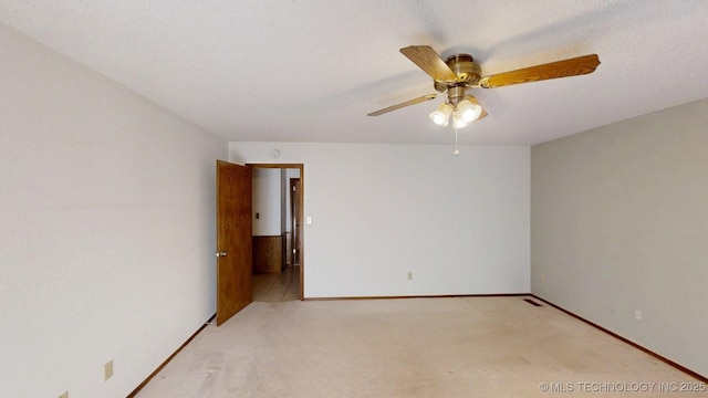 1124 Surrey Dr, Ardmore, OK 73401 - empty room with a ceiling fan and light colored carpet