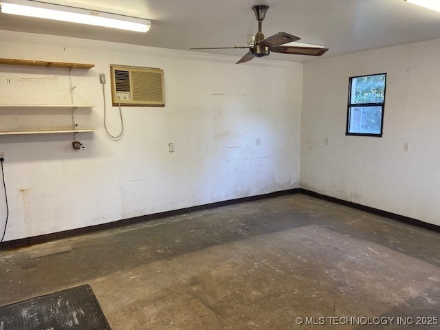 1124 Surrey Dr, Ardmore, OK 73401 - unfurnished room with unfinished concrete floors, a ceiling fan, and a wall mounted air conditioner
