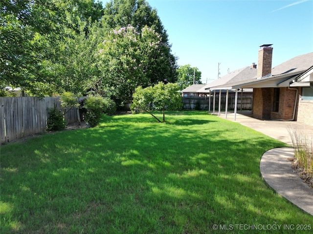 1124 Surrey Dr, Ardmore, OK 73401 - fenced backyard with a patio area