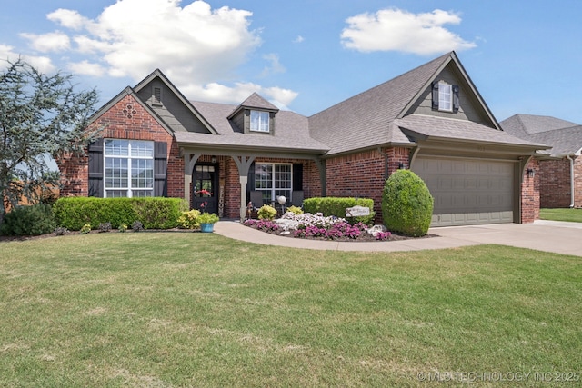921 S 75th St, Broken Arrow, OK 74014 - view of front of home featuring brick siding, roof with shingles, a garage, driveway, and a front yard