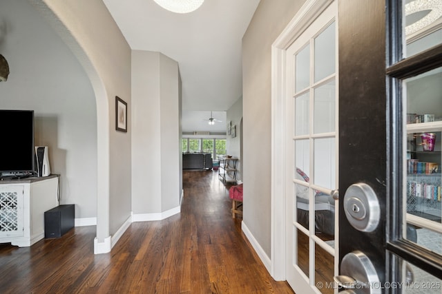 921 S 75th St, Broken Arrow, OK 74014 - hallway with arched walkways and wood finished floors