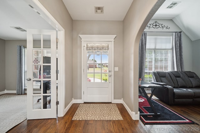921 S 75th St, Broken Arrow, OK 74014 - doorway to outside featuring wood finished floors and arched walkways