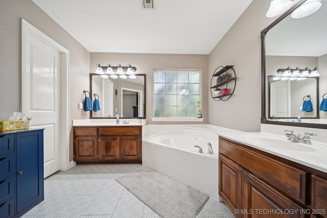 921 S 75th St, Broken Arrow, OK 74014 - full bath featuring two vanities and a garden tub