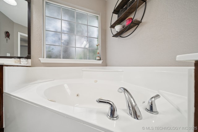 921 S 75th St, Broken Arrow, OK 74014 - bathroom featuring a tub with jets