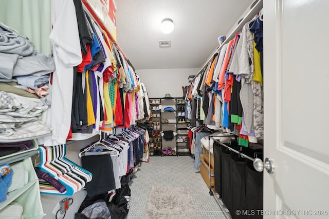 921 S 75th St, Broken Arrow, OK 74014 - spacious closet featuring carpet floors