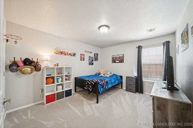 921 S 75th St, Broken Arrow, OK 74014 - carpeted bedroom featuring baseboards and a textured ceiling