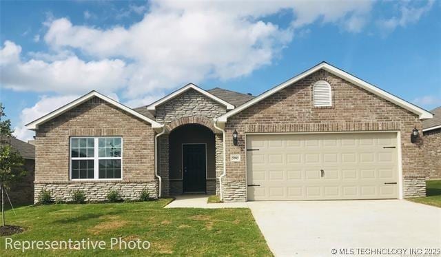 23100 S Mae Dr, Claremore, OK 74019 - view of front of home with an attached garage, concrete driveway, a front yard, and brick siding