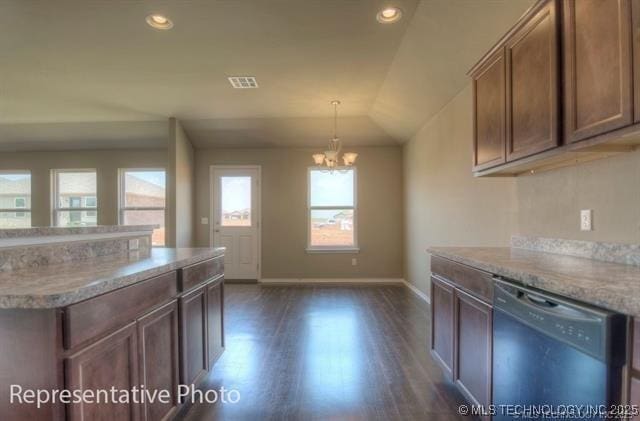 23100 S Mae Dr, Claremore, OK 74019 - kitchen featuring dishwashing machine, a chandelier, dark wood-type flooring, light countertops, and hanging light fixtures