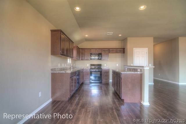 23100 S Mae Dr, Claremore, OK 74019 - kitchen featuring gas range, dark wood-style floors, vaulted ceiling, light countertops, and recessed lighting