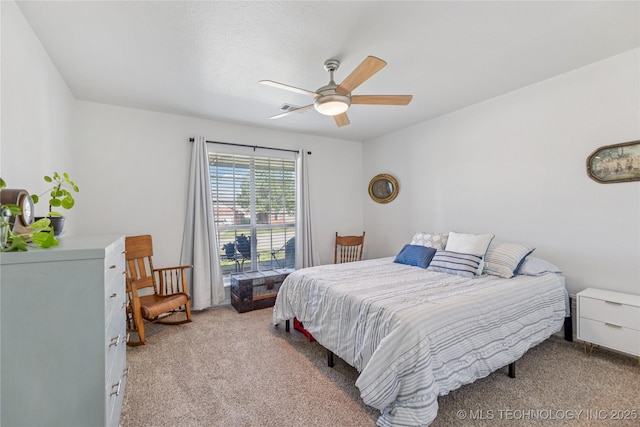 14907 E 88th St N, Owasso, OK 74055 - bedroom featuring light colored carpet and ceiling fan