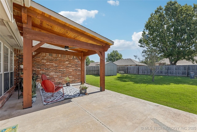 14907 E 88th St N, Owasso, OK 74055 - fenced backyard with a patio, ceiling fan, and a shed