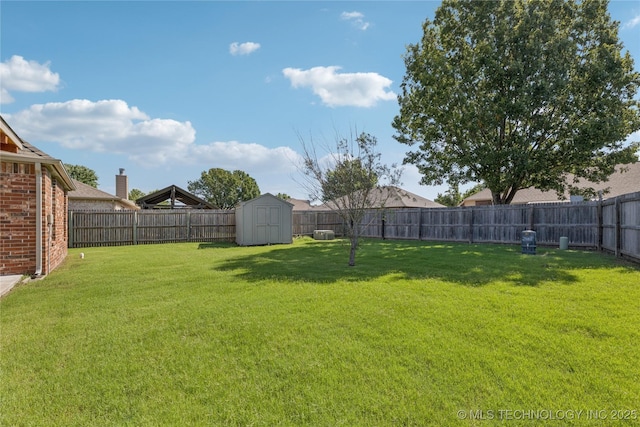 14907 E 88th St N, Owasso, OK 74055 - fenced backyard featuring a storage shed