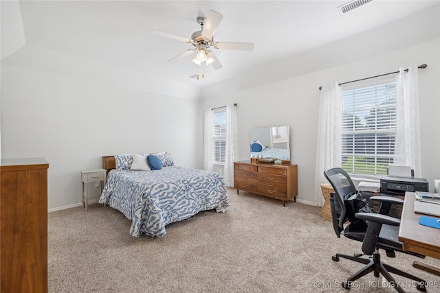 14907 E 88th St N, Owasso, OK 74055 - carpeted bedroom with multiple windows, a desk, and a ceiling fan