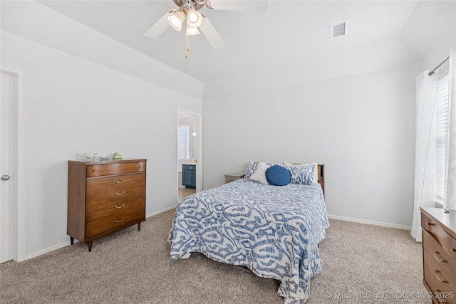 14907 E 88th St N, Owasso, OK 74055 - bedroom featuring carpet, vaulted ceiling, ceiling fan, and ensuite bath