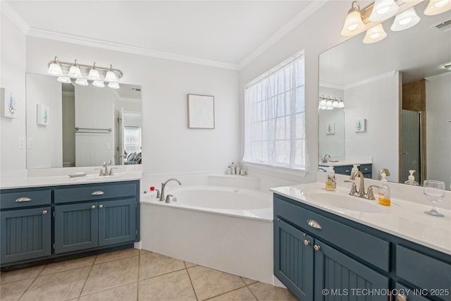 14907 E 88th St N, Owasso, OK 74055 - bathroom with crown molding, a garden tub, two vanities, tile patterned floors, and a shower stall