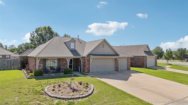 14907 E 88th St N, Owasso, OK 74055 - traditional-style house featuring brick siding, an attached garage, concrete driveway, roof with shingles, and a porch